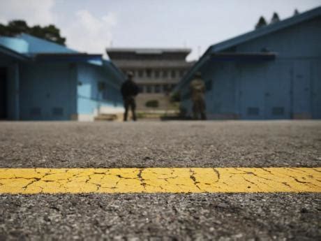 The American detained in North Korea after crossing the border was a US soldier, officials tell AP